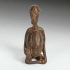 Seated Male Ancestor Figure Holding Jug